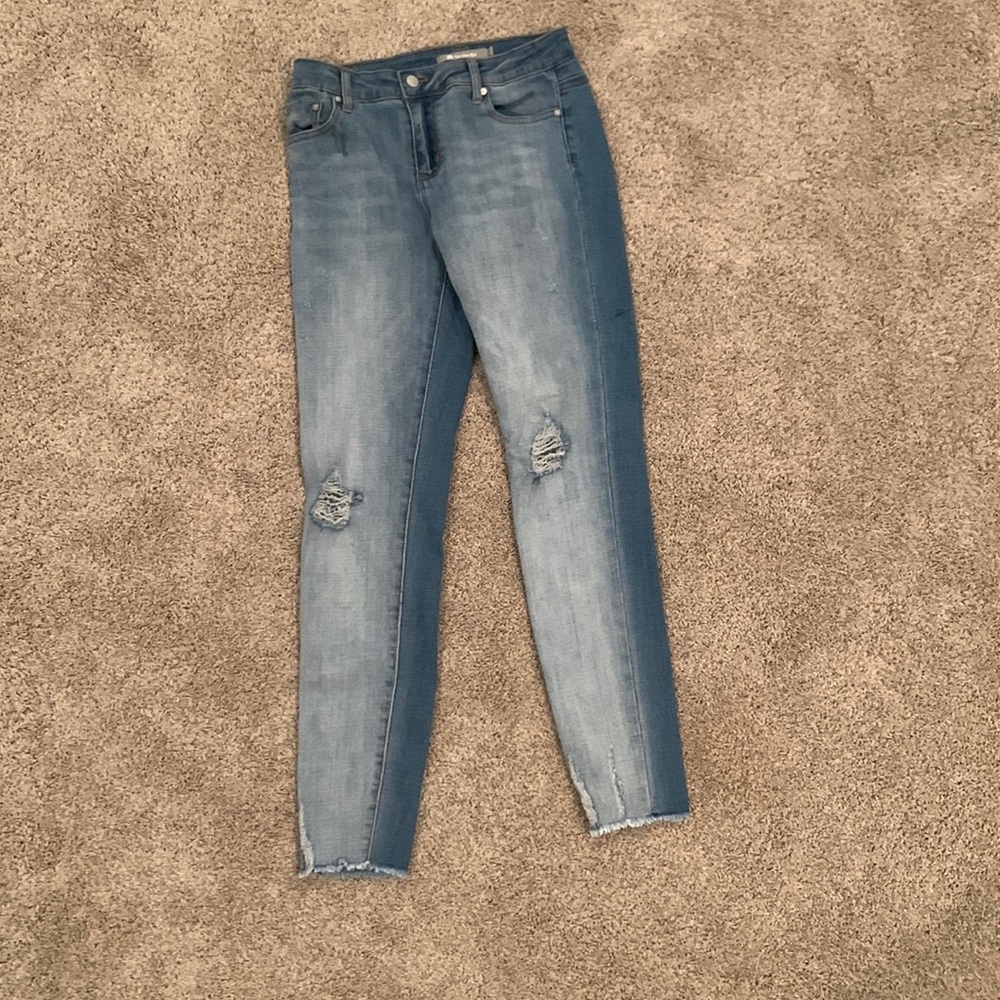 Cute distressed jeans! Brand: Tractr
